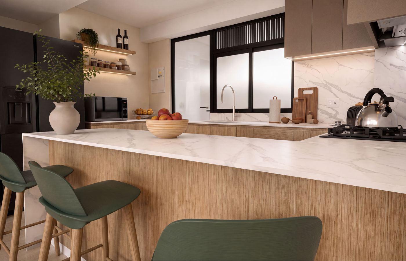 Cocina integrada con isla y taburetes en Casuarinas 339